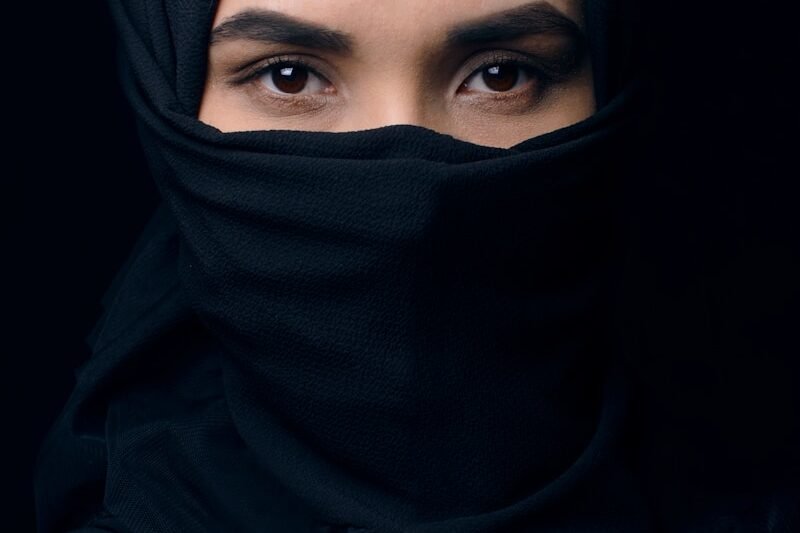 a woman wearing a black hijab