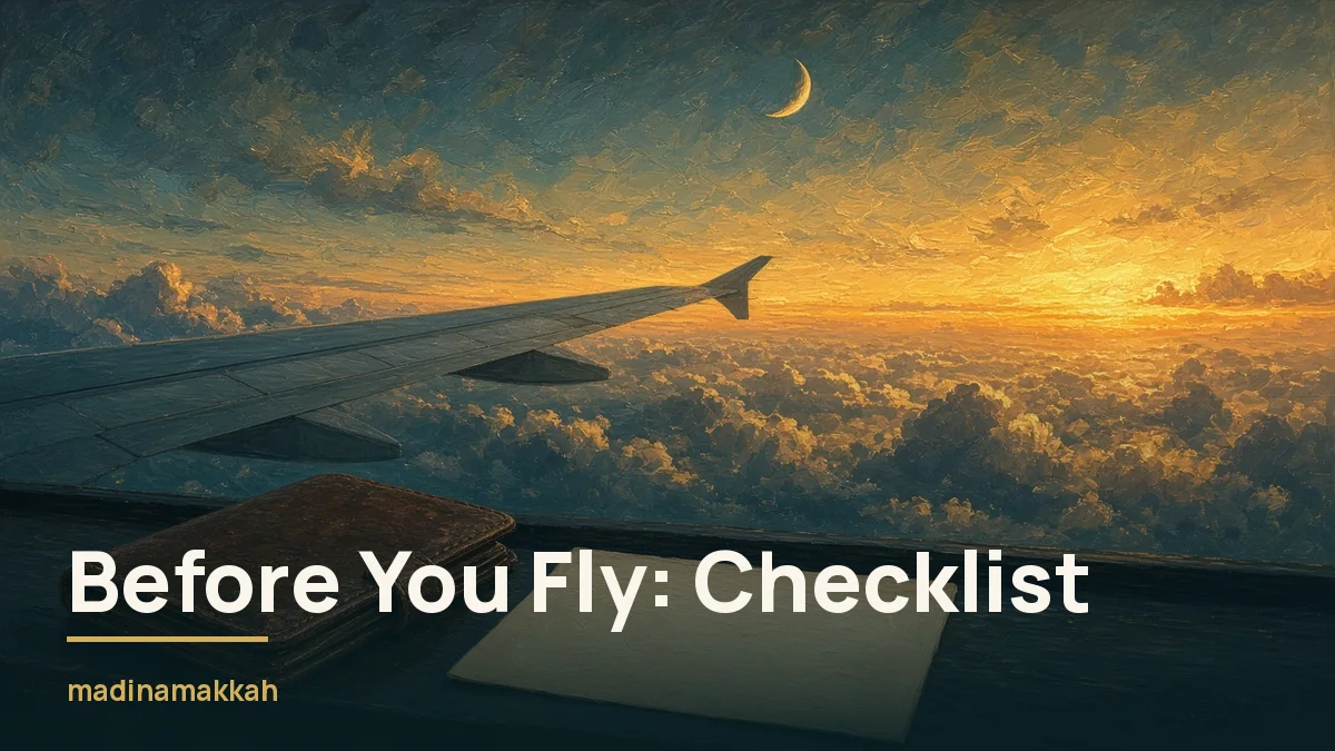 Plane wing above sunset clouds with crescent, passport wallet and blank card on ledge